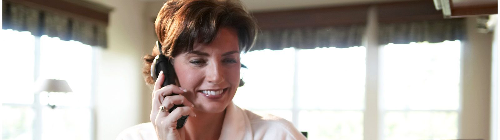 Smiling woman on phone