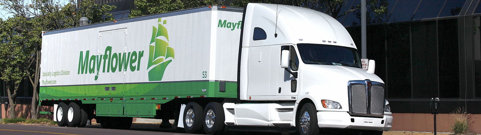 Mayflower truck in front of building
