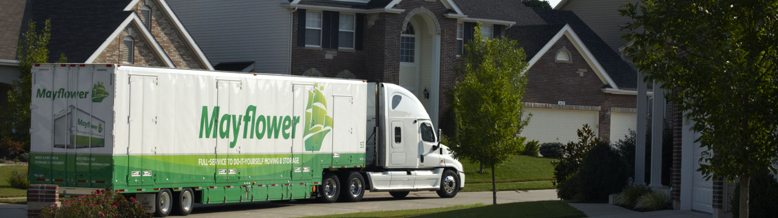 Mayflower truck in neighborhood